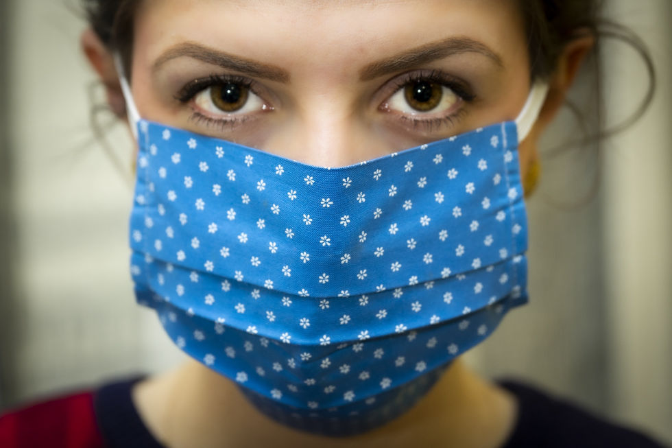 Women in blue face mask